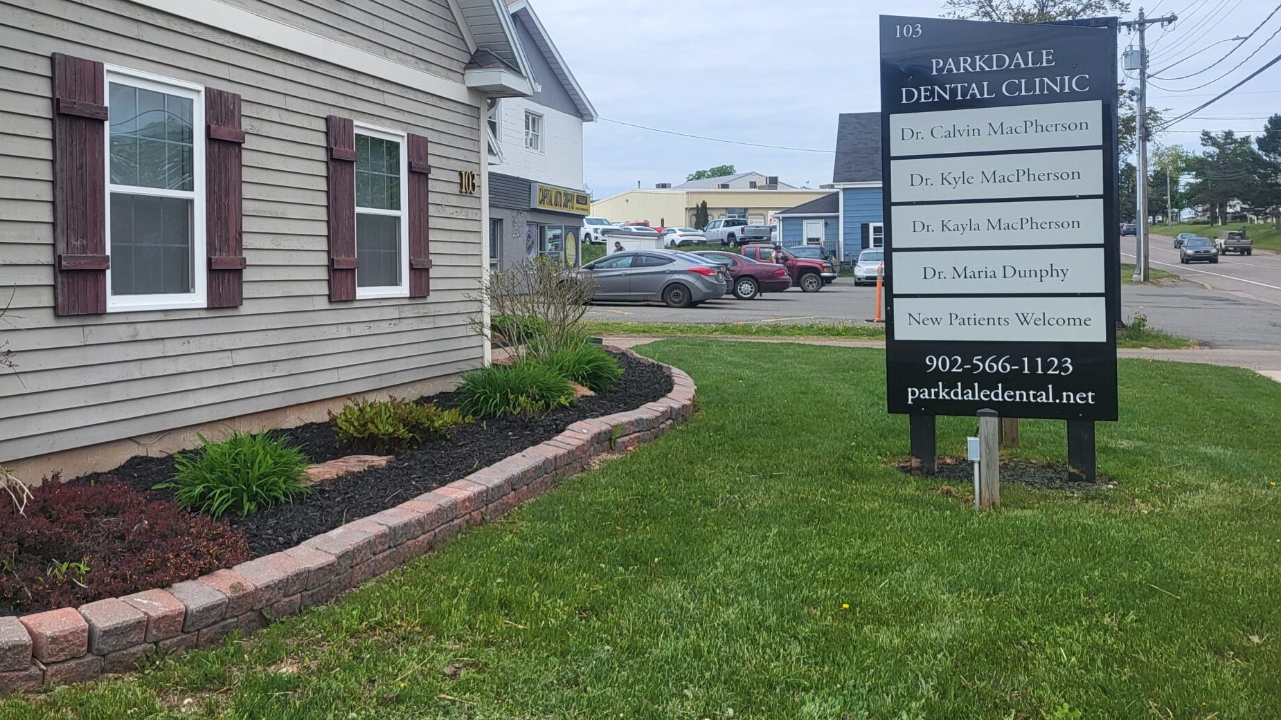 The Parkdale Dental Clinic building and roadside sign at 103 St Peters Road, Charlottetown
